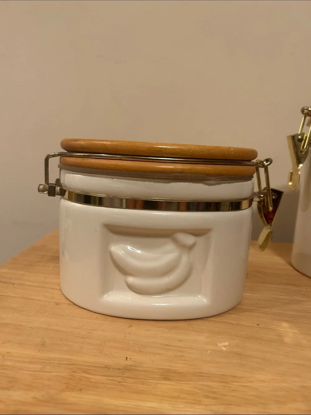 Vintage Preferred Stock Embossed Ceramic Kitchen Canister Set with wooden lids.